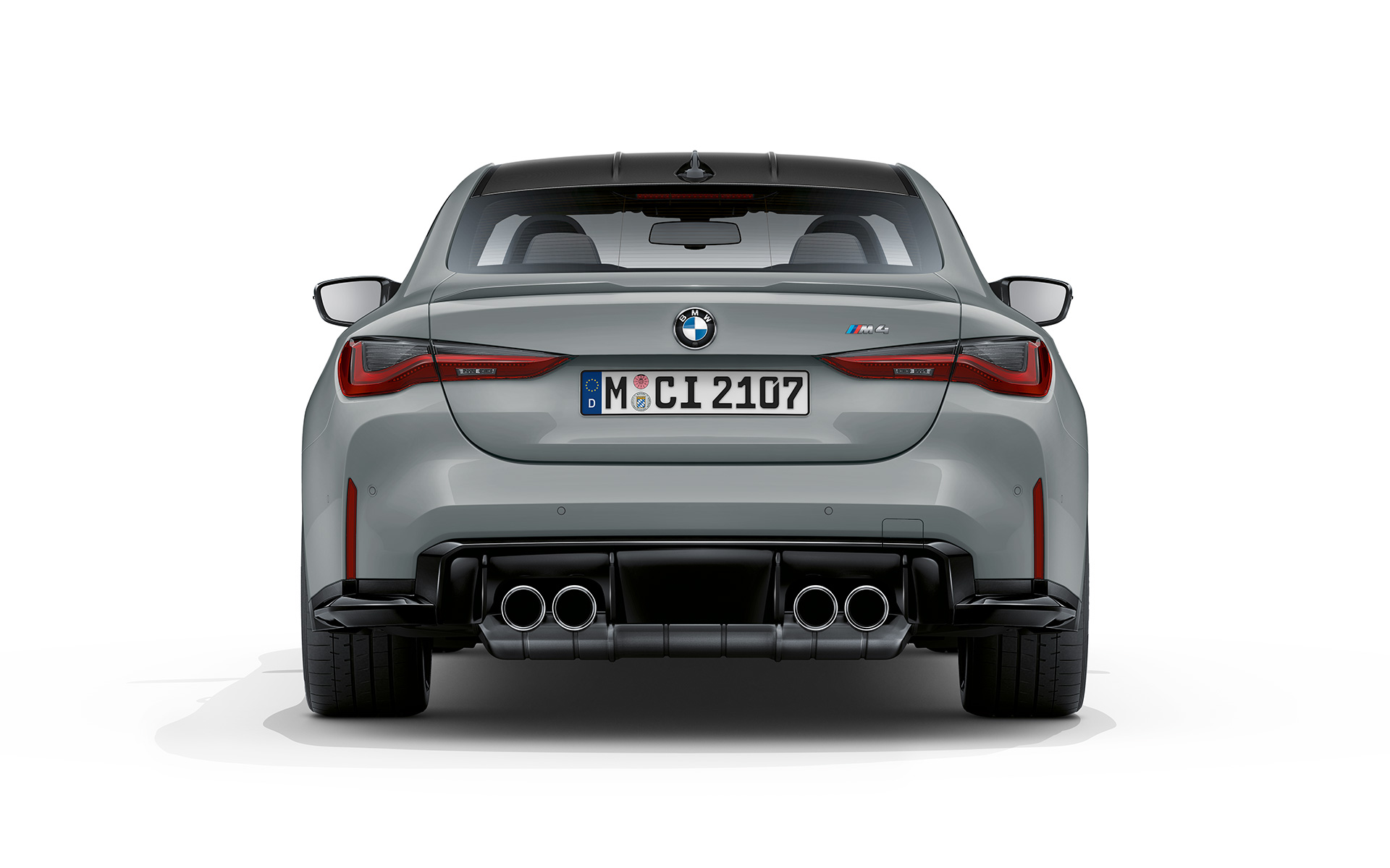 BMW M4 Coupé G82 2020 в цвете Brooklyn Grey металлик, вид сзади